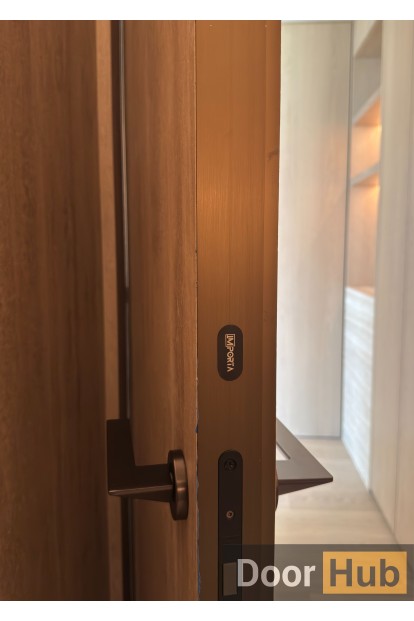 Natural Veneer Interior Door with Timeless Gold Anodized Profile – Developer Supply UAE Natural Veneer Interior Door with Timeless Gold Anodized Profile – Developer Supply UAE